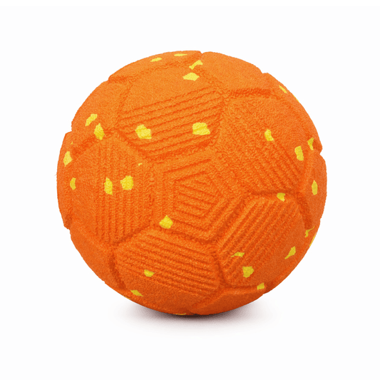 Smart bouncing football dog toy with unpredictable movement changes to encourage exercise and mental stimulation