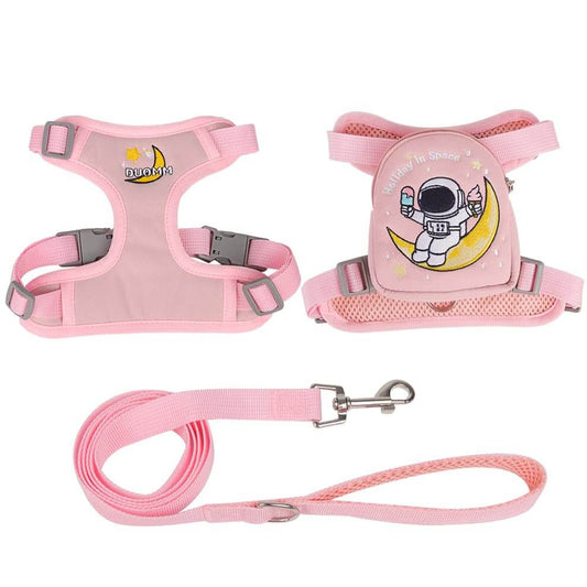 Pink dog backpack harness with cute astronaut design and leash