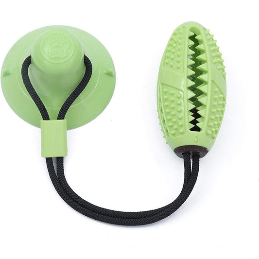 Green dog chew toy with suction cup, textured design for chewing and teeth cleaning