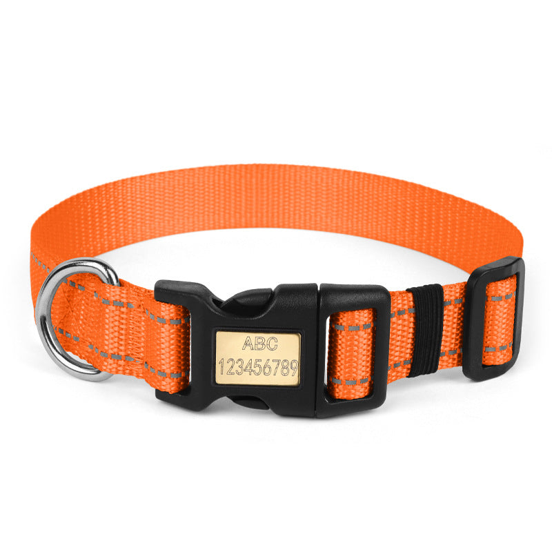 Nylon dog collar in orange with reflective lines, adjustable buckle, and personalized nameplate