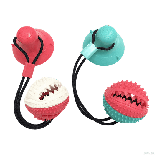 Suction cup dog toy with durable chew design and dental care function
