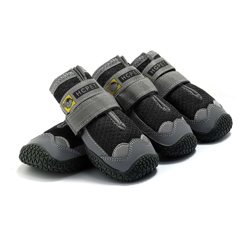Dog boots for large dogs (Black Explorer) with air-mesh fabric to protect paws from burning on hot pavement.
