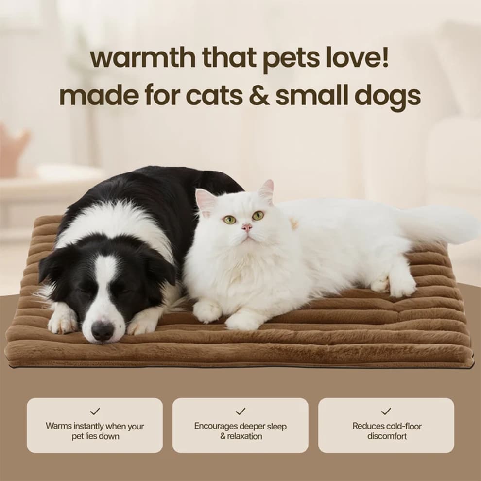 A black and white dog and a white cat sleeping together on a brown self warming pet mat, showing it encourages deeper sleep for all pets.