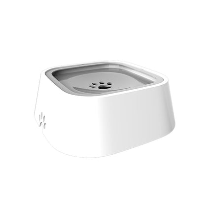 Floating disk pet water bowl in modern gray, offering a gentle water flow that promotes a natural and safe drinking posture.
