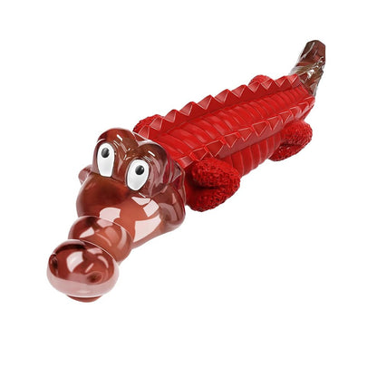 Heavy-duty dog chew toy in red, featuring a textured surface designed to massage gums and clean teeth effectively.