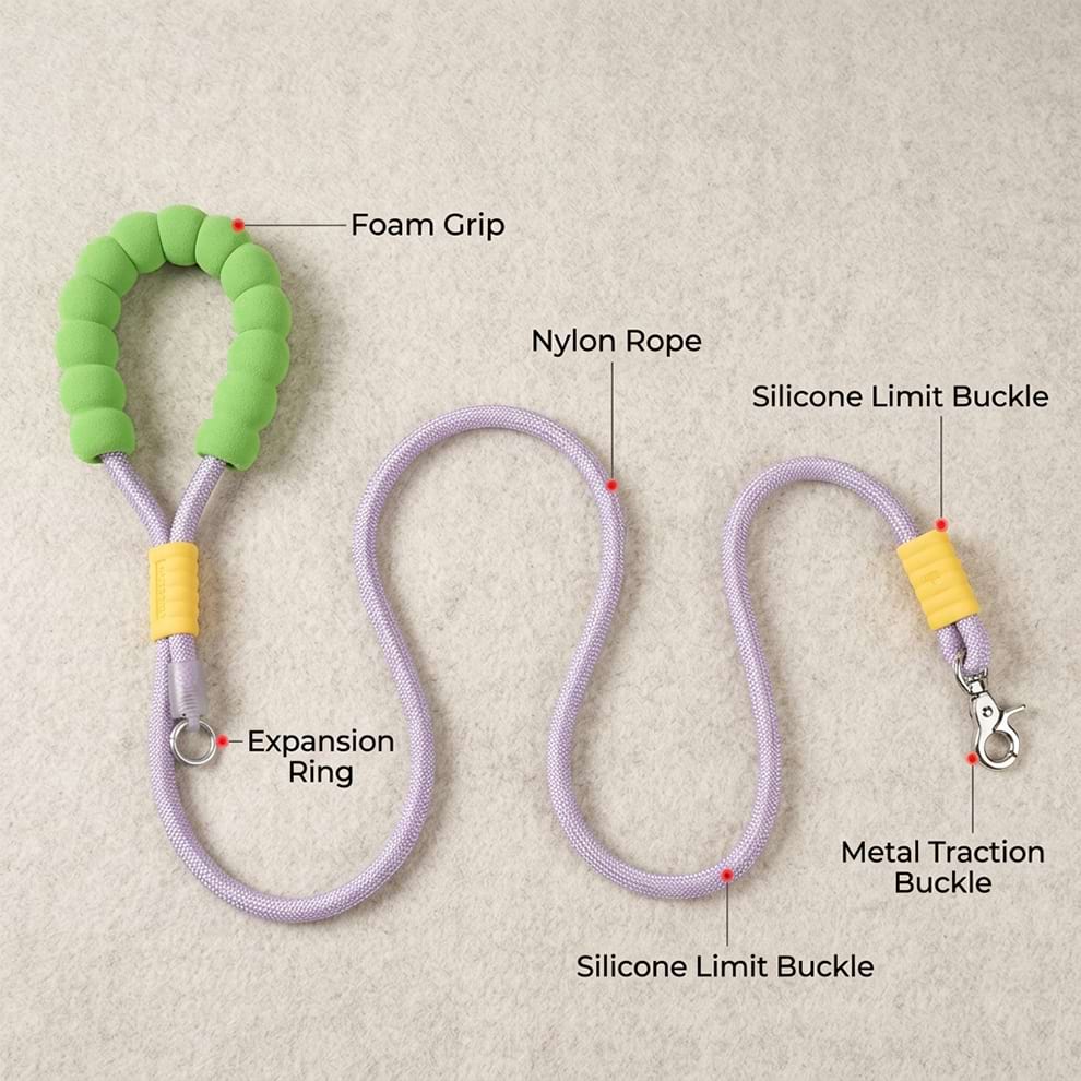 Heavy duty dog leash anatomy showcasing the soft foam grip, durable nylon rope, expansion ring, and secure metal traction buckle.