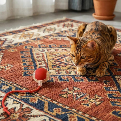 Moving cat enrichment toy capturing the full attention of a Bengal cat, perfect for stimulating stalking and hunting behaviors.