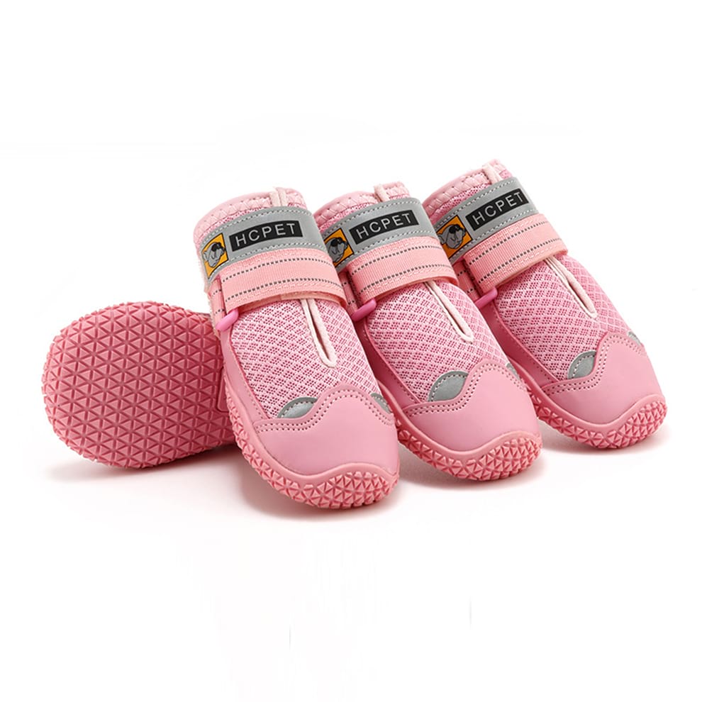 Summer dog shoes in pink, featuring a lightweight breathable design for style and comfort during warm walks.