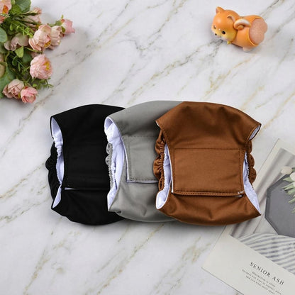 Reusable pet diapers for incontinence displayed on marble, combining elegant design with ultimate absorbency for senior dogs.