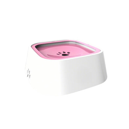 Spill-proof dog water bowl in soft pink, utilizing a floating plate to prevent messy splashes and wet mouths during hydration.