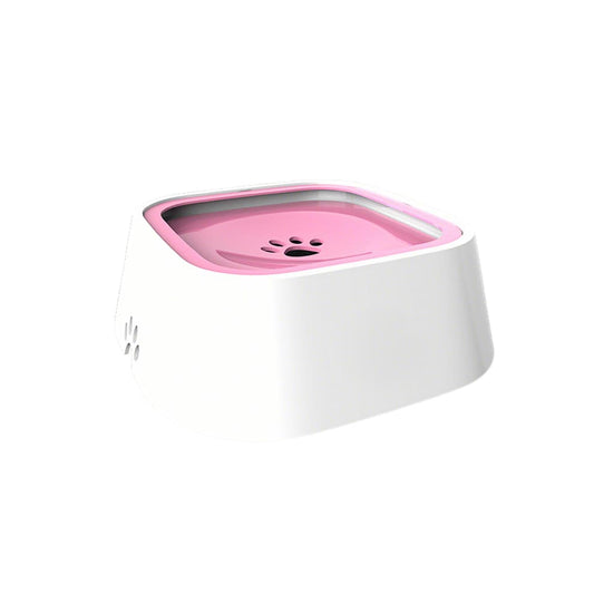 Spill-proof dog water bowl in soft pink, utilizing a floating plate to prevent messy splashes and wet mouths during hydration.