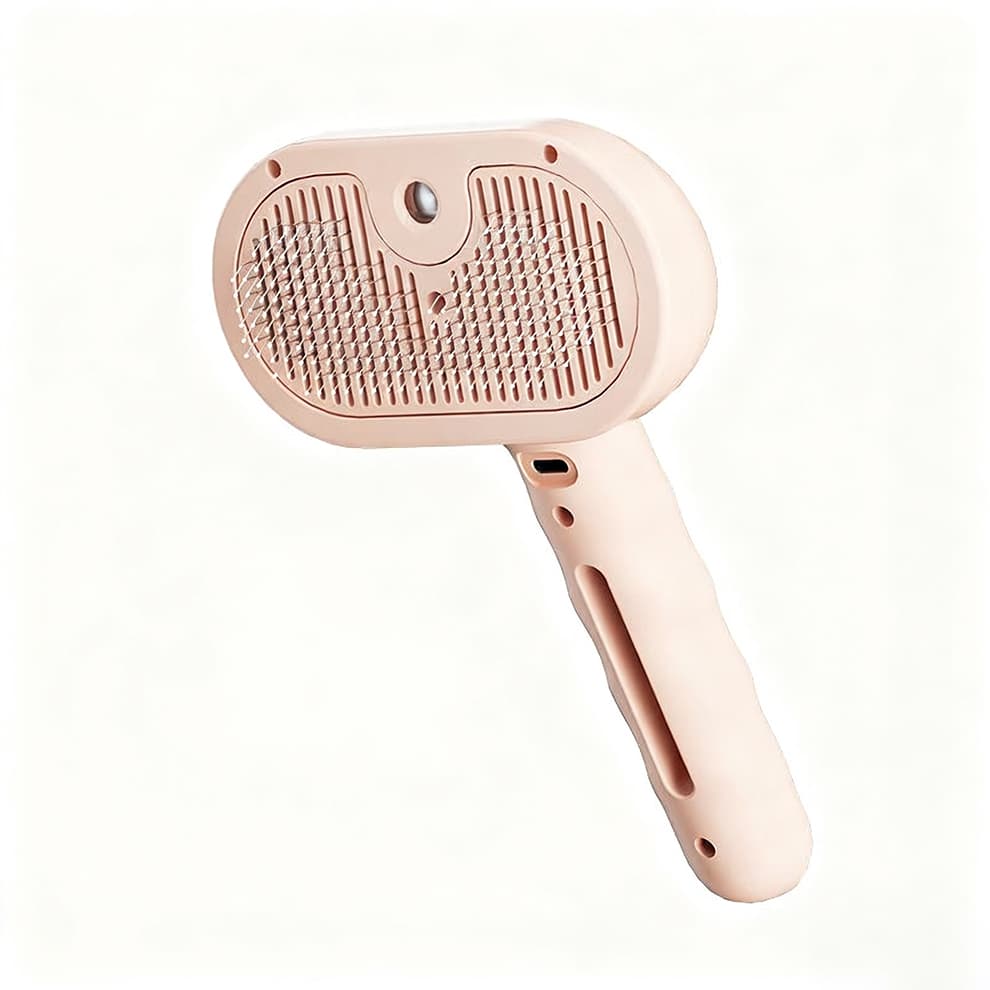 Steamy cat brush in pastel pink, designed with skin-friendly teeth for a comfortable, relaxing, and anti-static grooming experience.