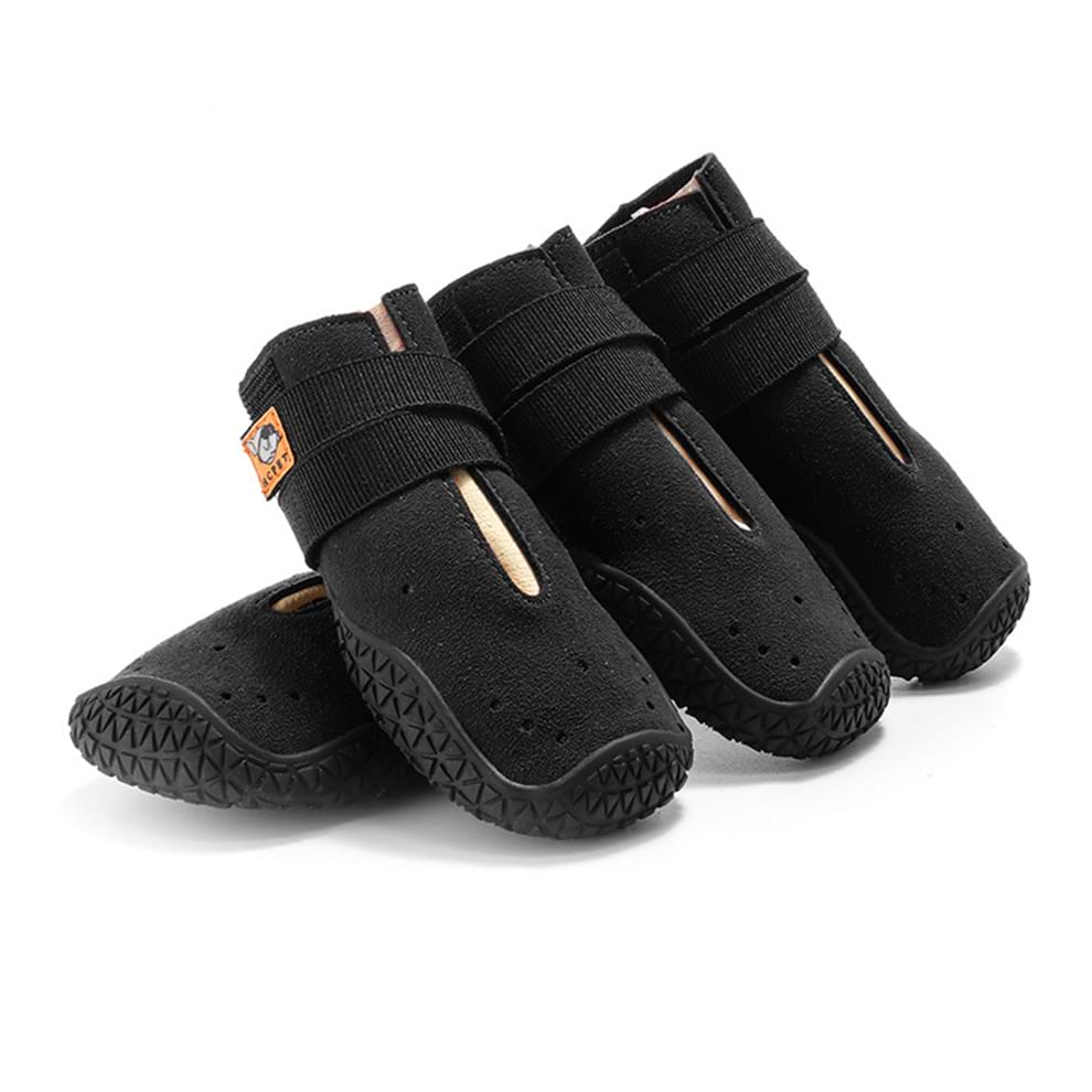 Rugged dog boots in black (Summit Series), offering breathable comfort and superior grip for climbing and uneven terrain.