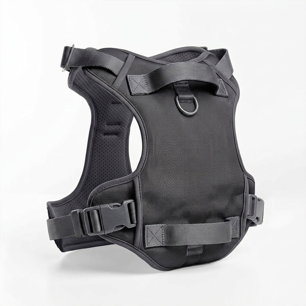 Tactical K9 harness showcasing its ergonomic design, sturdy stitching, and multiple attachment points for leashes and gear.