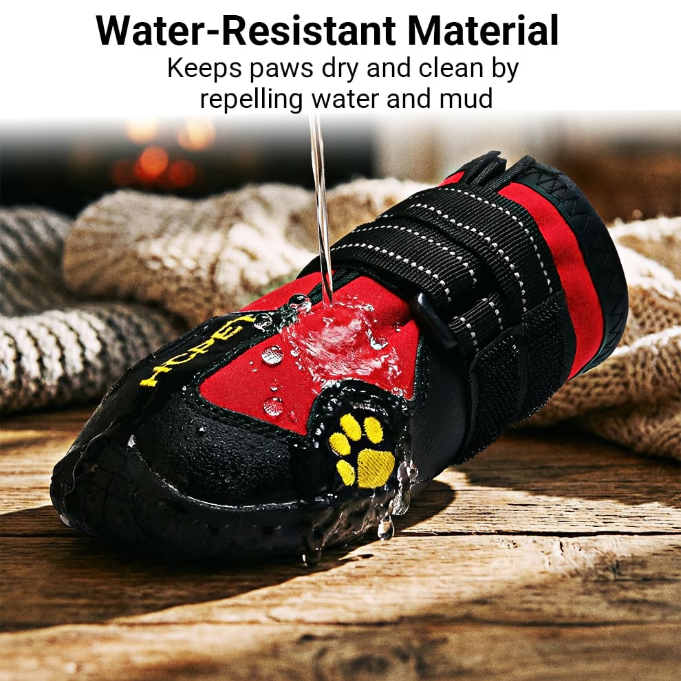 Water being poured on waterproof dog boots for rain, showing liquid repelling off the fabric to keep paws dry.